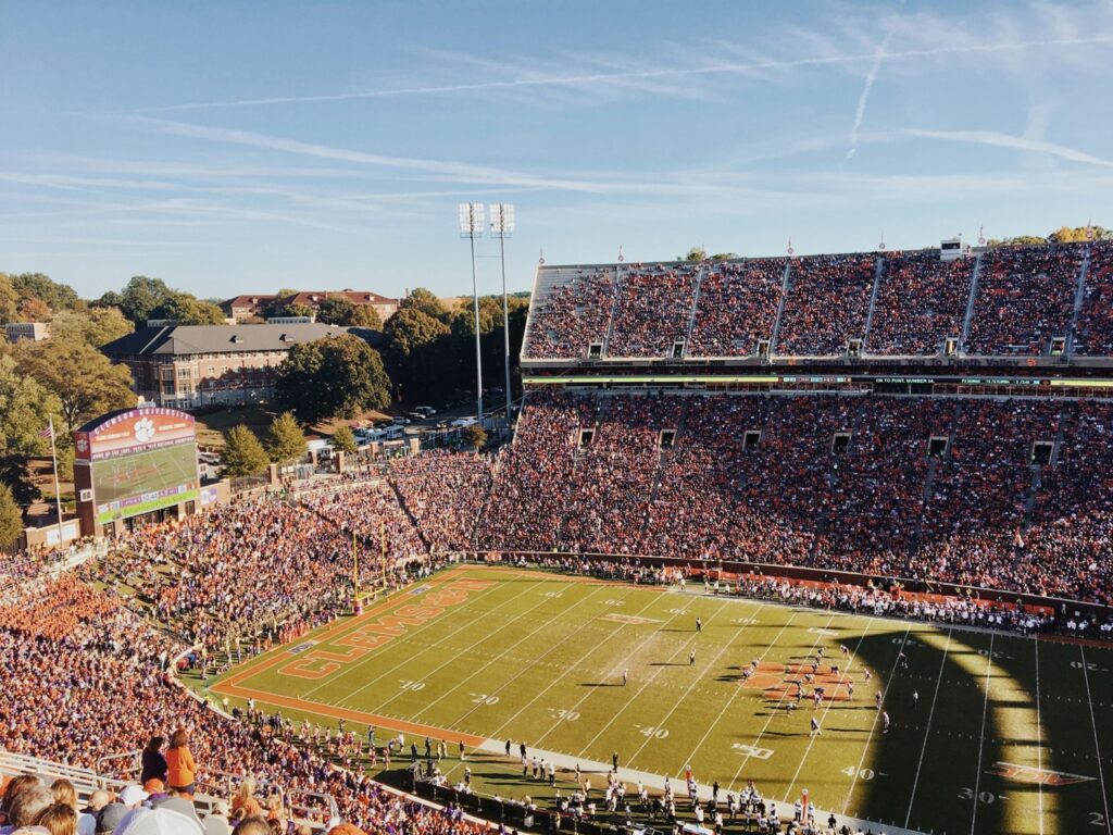 Packed crowd in orange at Clemson Memorial Stadium (Death Valley) on a fall game day